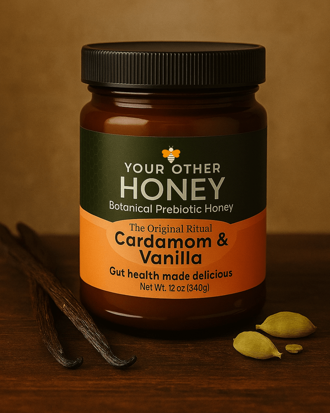 Jar of 'Your Other Honey' Cardamom & Vanilla honey on a wooden surface with a brown background